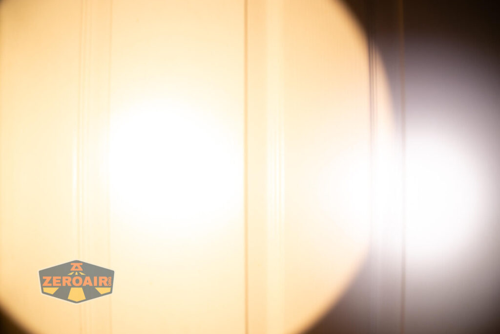 Skilhunt EC500 warm white flashlight beamshots on door (at 1') compared to nichia 219b 4500K