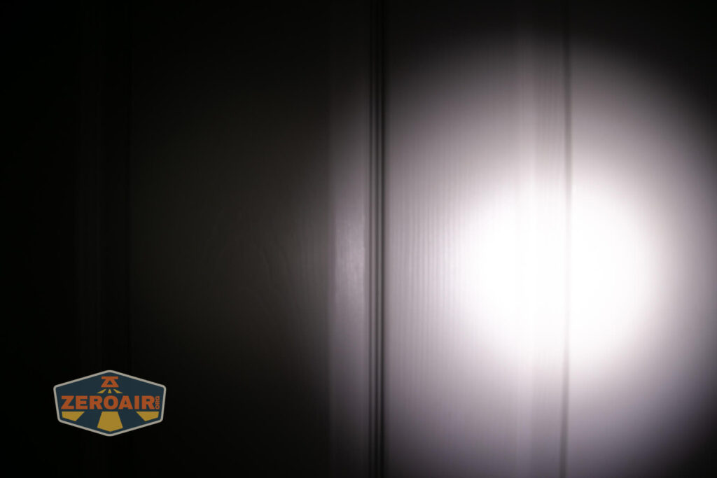 Wurkkos TS10 MAX flashlight beamshots on door compared to nichia 219b