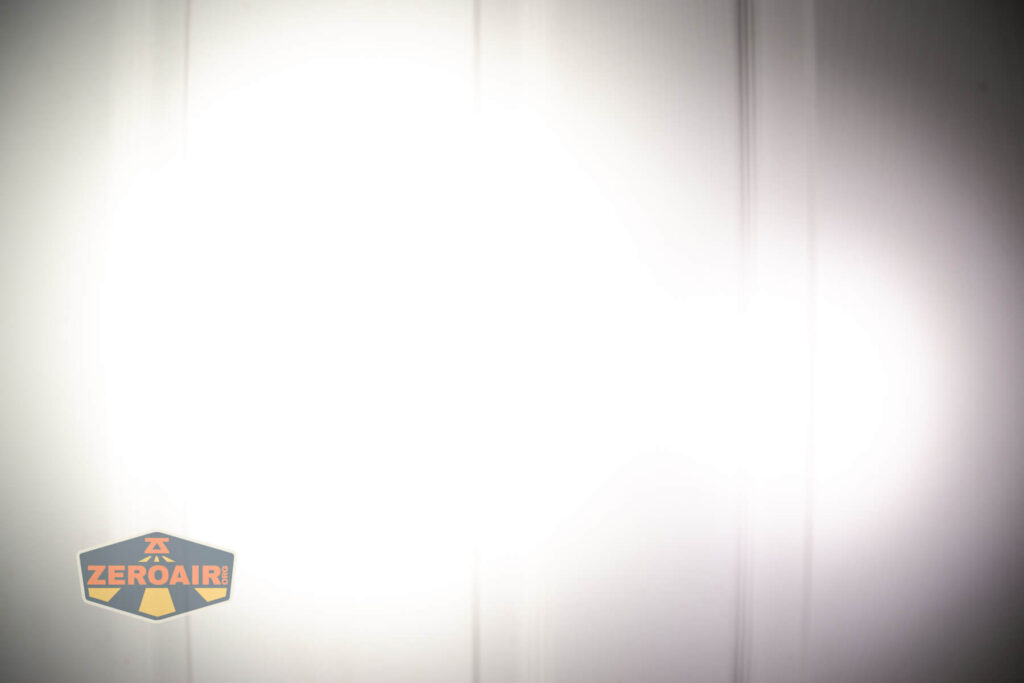 Wurkkos TS10 MAX flashlight beamshots on door compared to nichia 219b