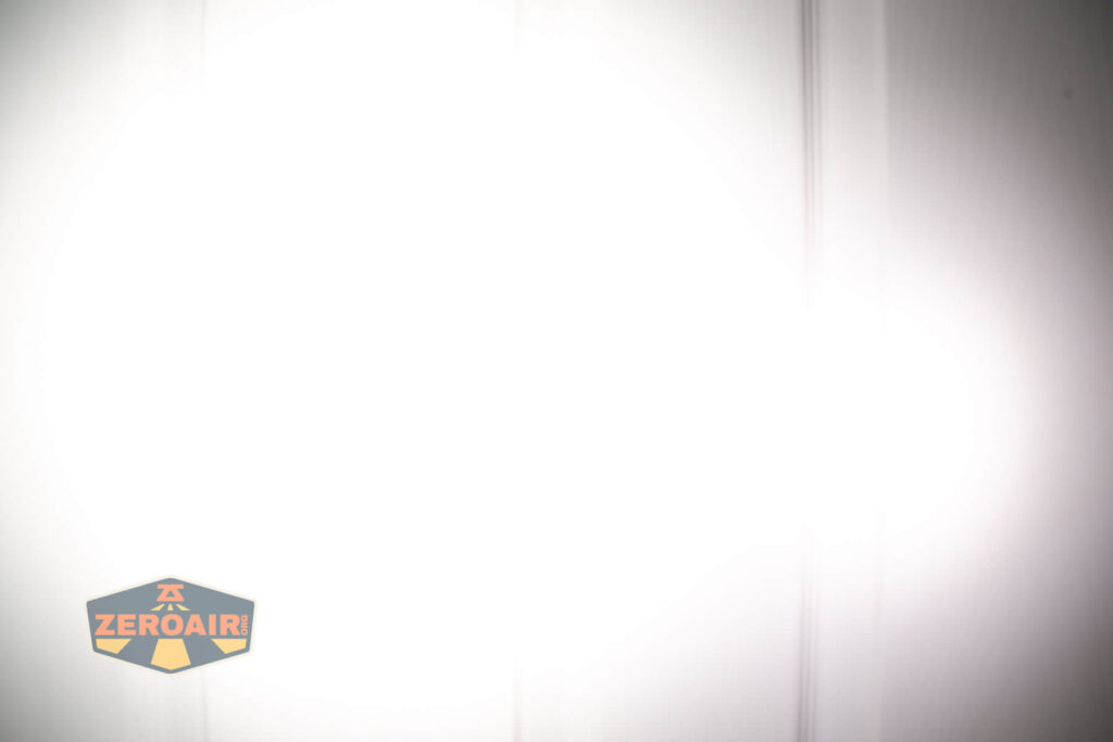 Wurkkos TS10 MAX flashlight beamshots on door compared to nichia 219b