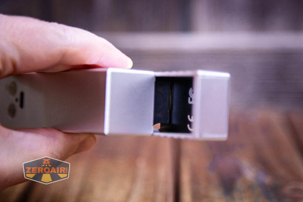 Cyansky Vanguard flashlight inside tail of light