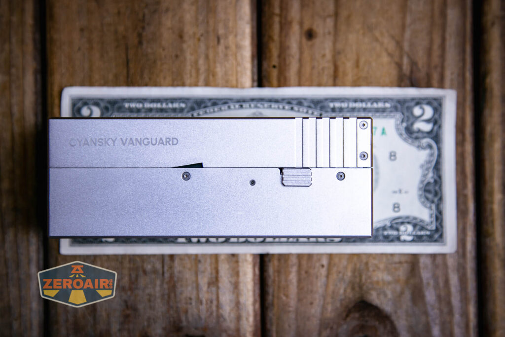 Cyansky Vanguard flashlight on a two dollar bill