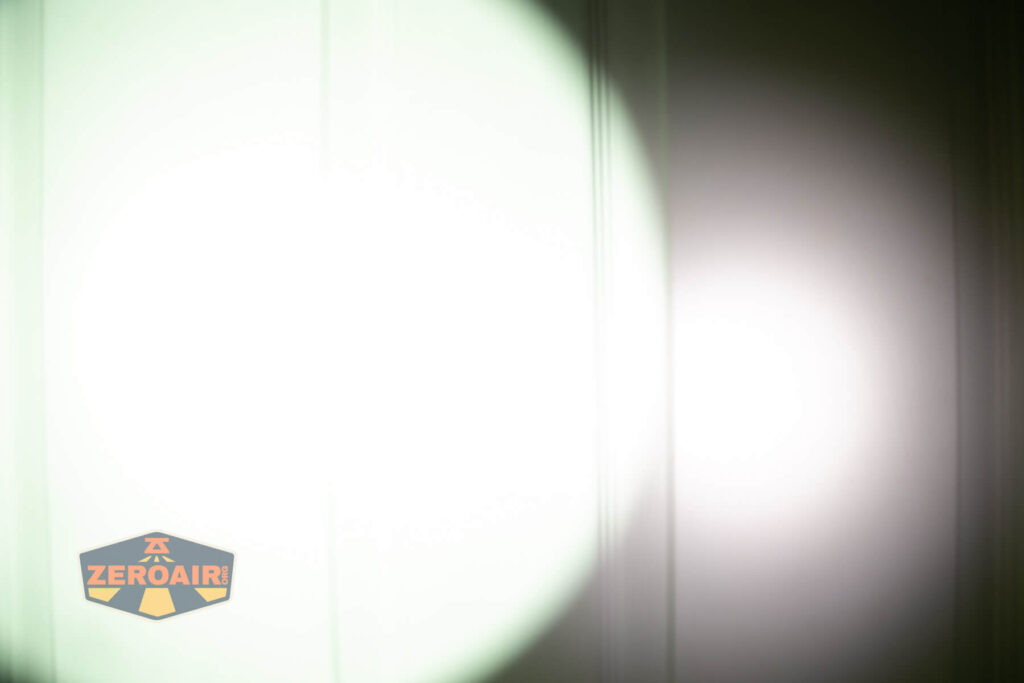 Cyansky Vanguard flashlight beamshots on door (at 1') compared to nichia 219b 4500K