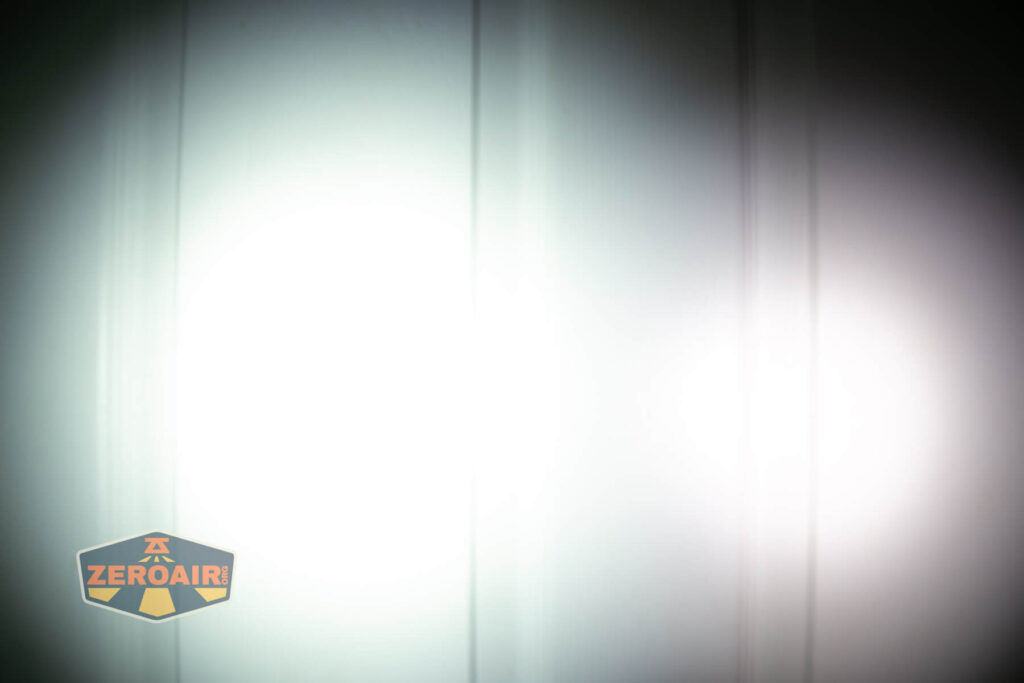 Nextorch K30 penlight beamshots on door (at 1') compared to nichia 219b 4500K