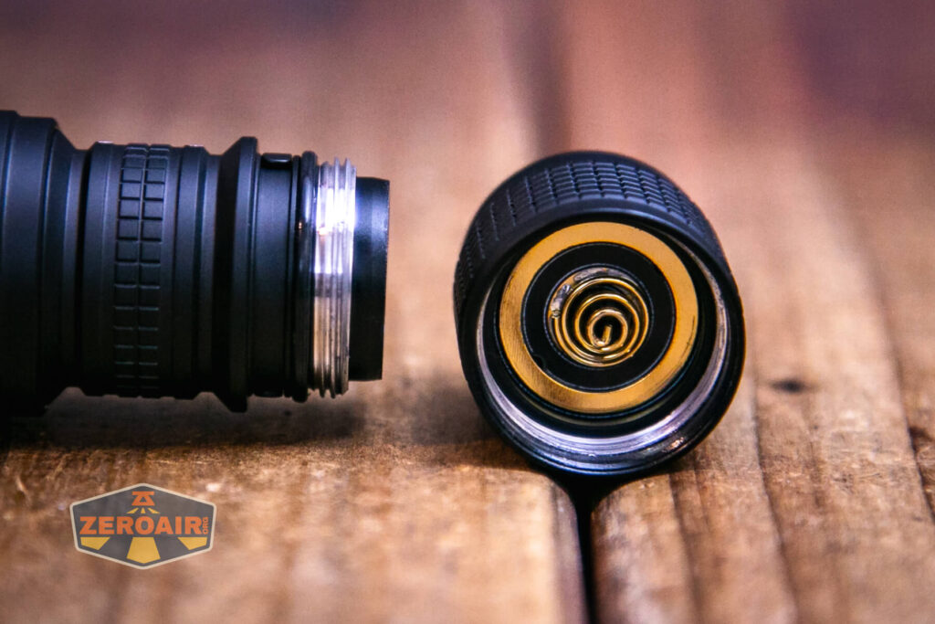 Nextorch TA21 portable tactical flashlight tailcap threads and spring