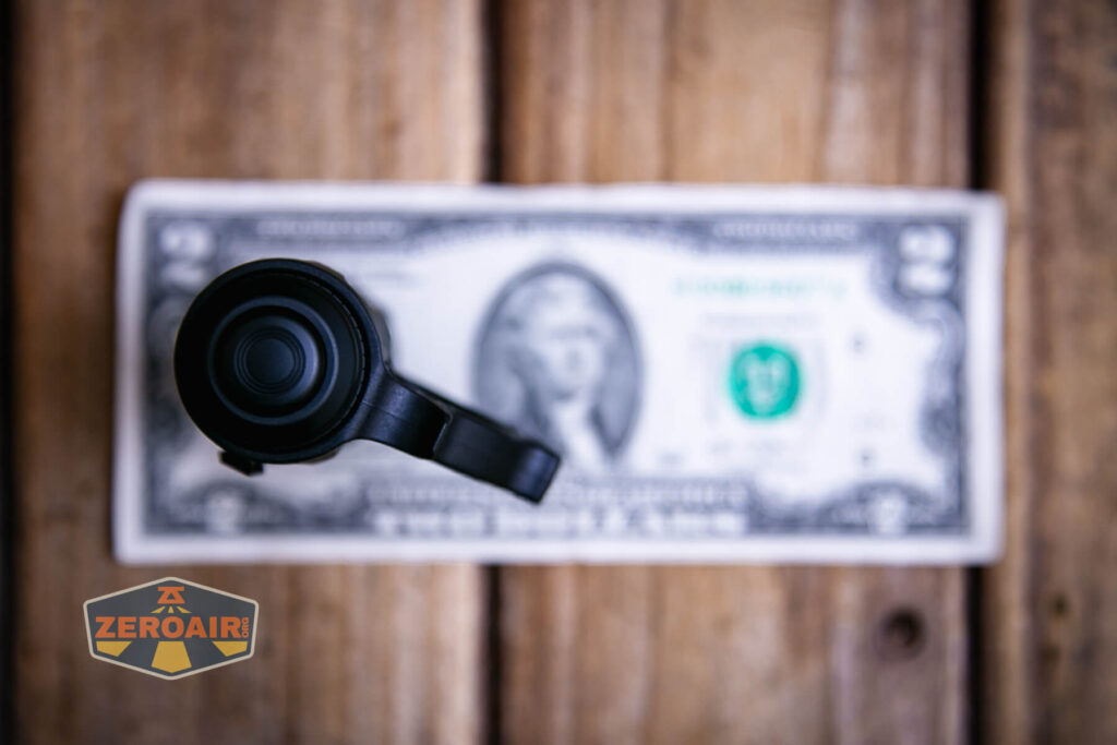 Nextorch TA21 portable tactical flashlight on a two dollar bill