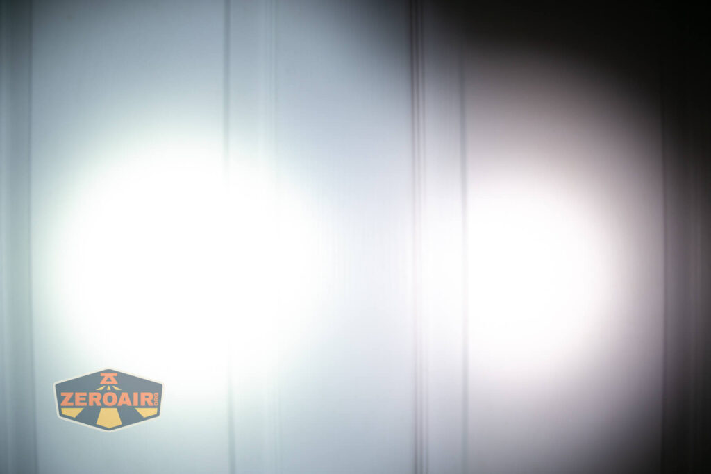 Nextorch TA21 portable tactical flashlight beamshots on door (at 1') compared to nichia 219b 4500K