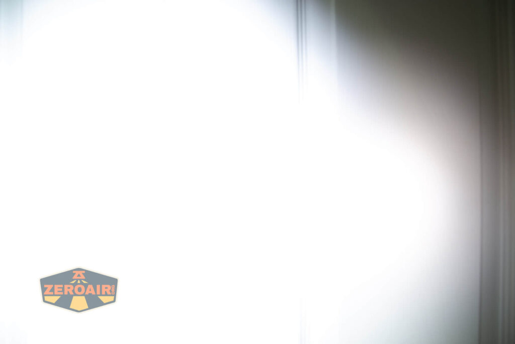 Nextorch TA21 portable tactical flashlight beamshots on door (at 1') compared to nichia 219b 4500K