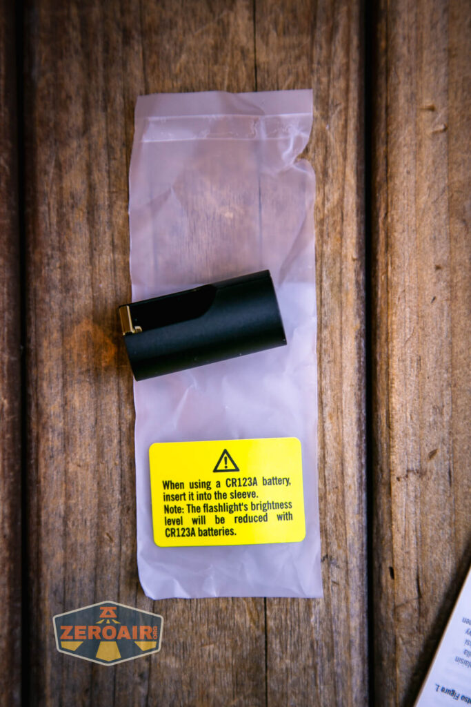 Olight Baton Turbo Orange flashlight CR123 warning