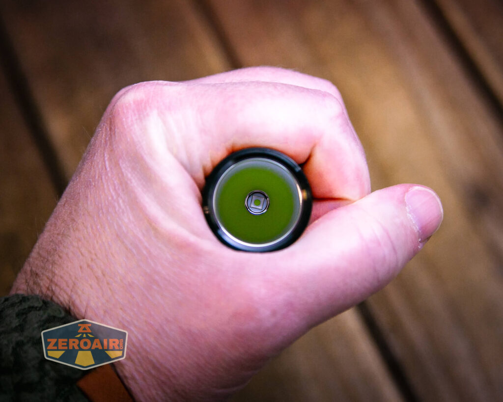 Olight Baton Turbo Orange flashlight in hand