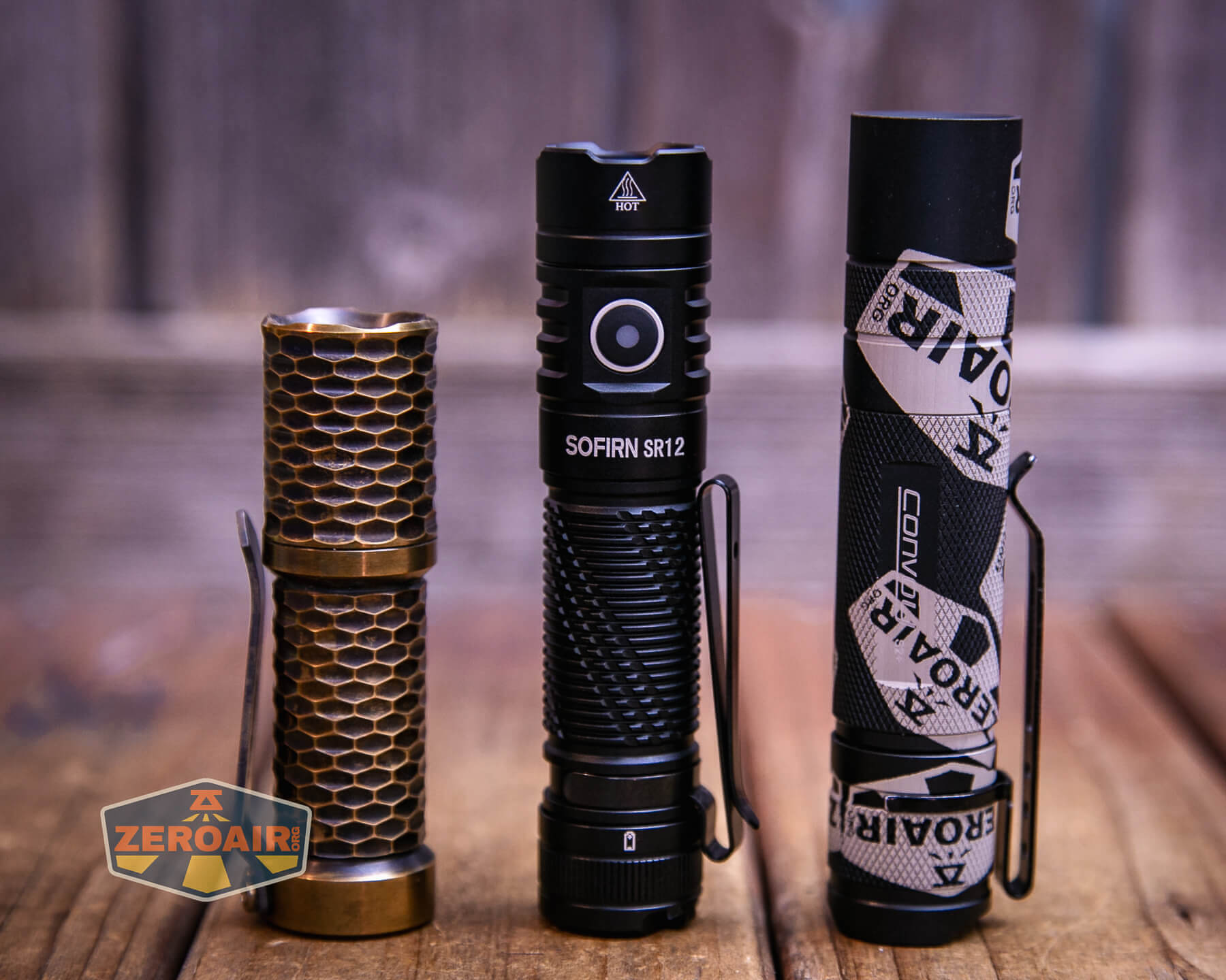 Sofirn SR12 pocket flashlight with two standard sized flashlights