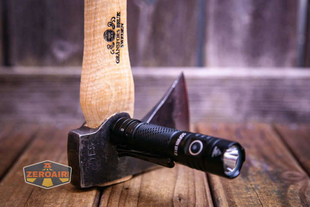 Sofirn SR12 Pocket flashlight tailcap magnet in use