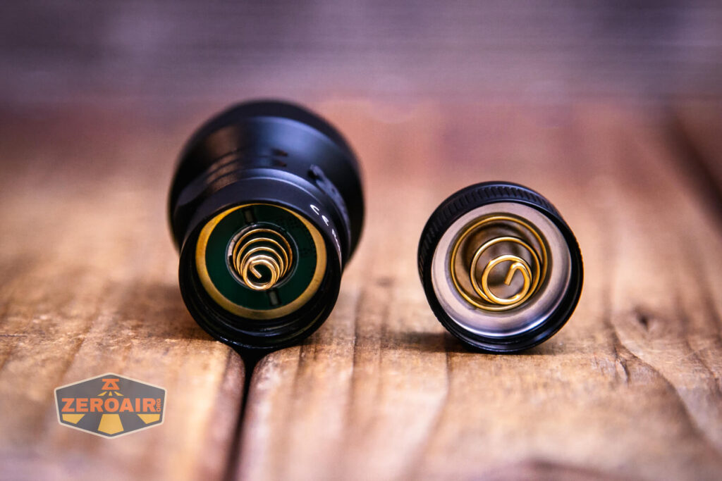 Sofirn SR20 Mini EDC flashlight showing dual springs