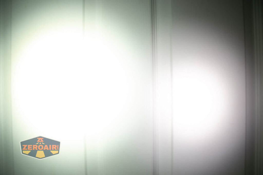 Sofirn SR20 Mini EDC flashlight beamshots on door (at 1') compared to nichia 219b 4500K