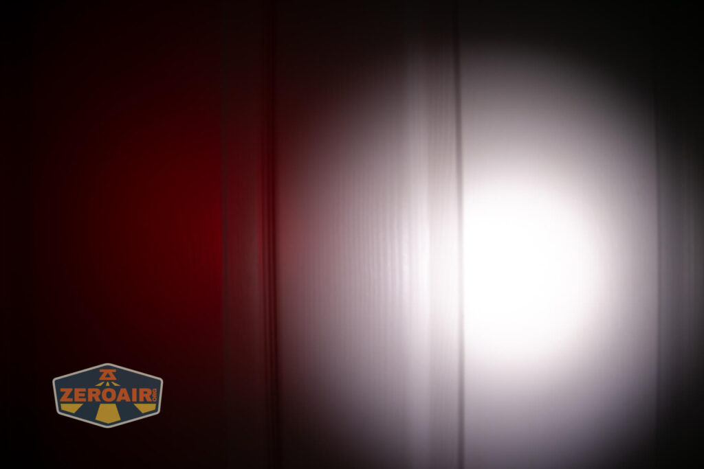 Sofirn SR20 Mini EDC flashlight beamshots on door (at 1') compared to nichia 219b 4500K