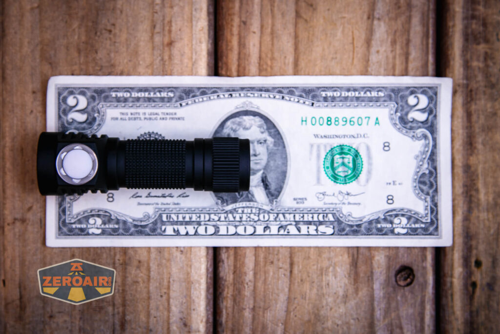 Emisar D3AA 4500K flashlight on a two dollar bill
