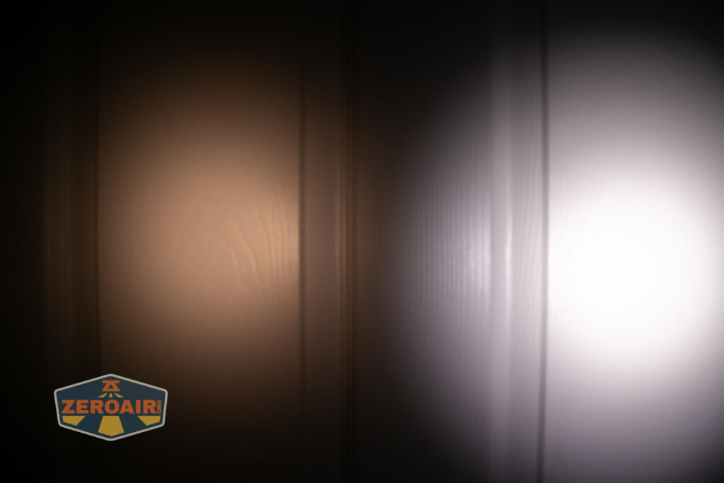 Emisar D3AA 4500K flashlight beamshots on door (at 1') compared to nichia 219b 4500K