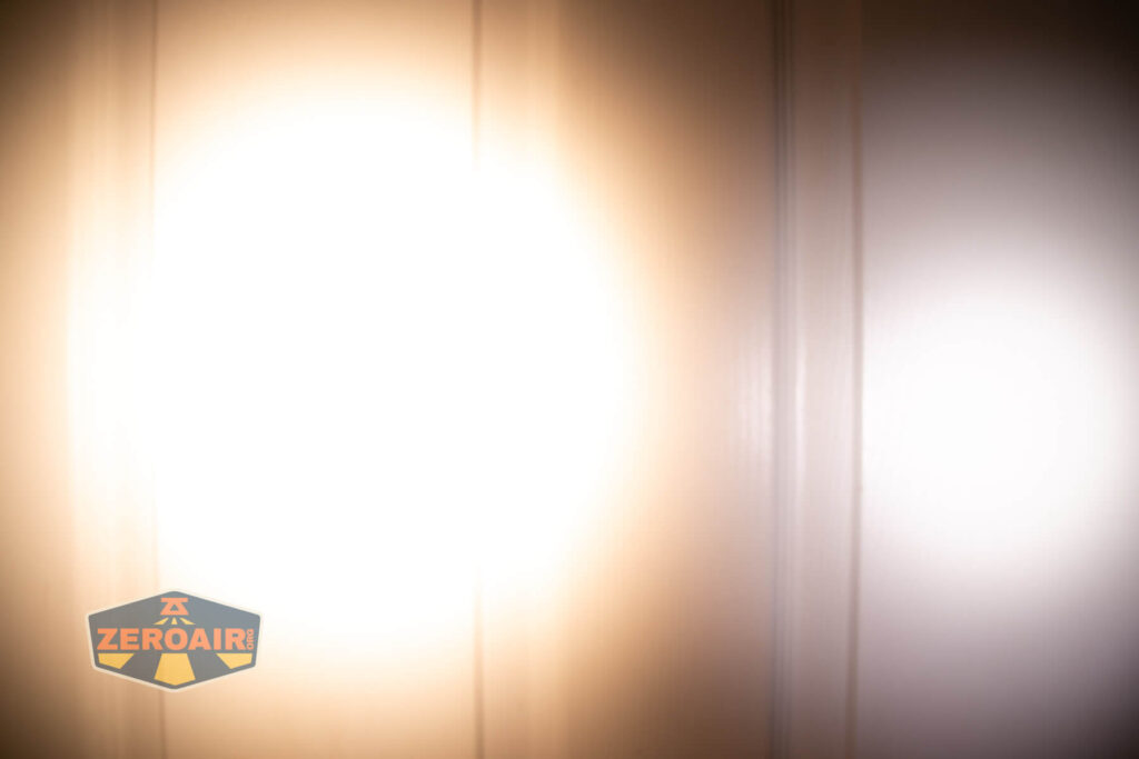 Emisar D3AA 4500K flashlight beamshots on door (at 1') compared to nichia 219b 4500K