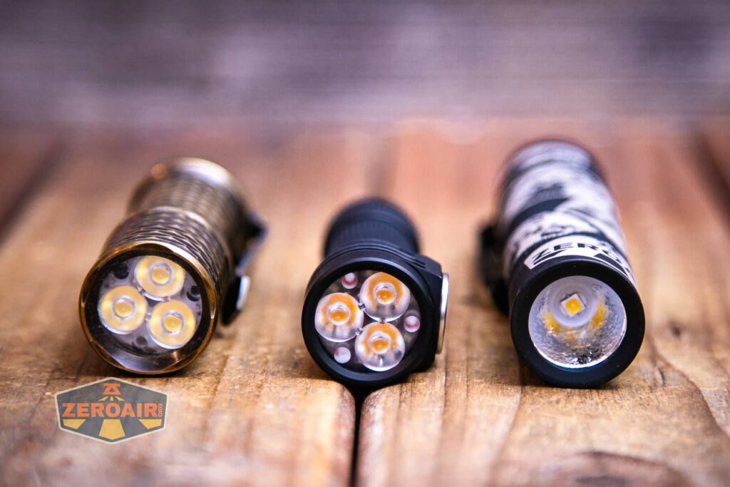 Emisar D3AA 4500K flashlight with two standard sized flashlights