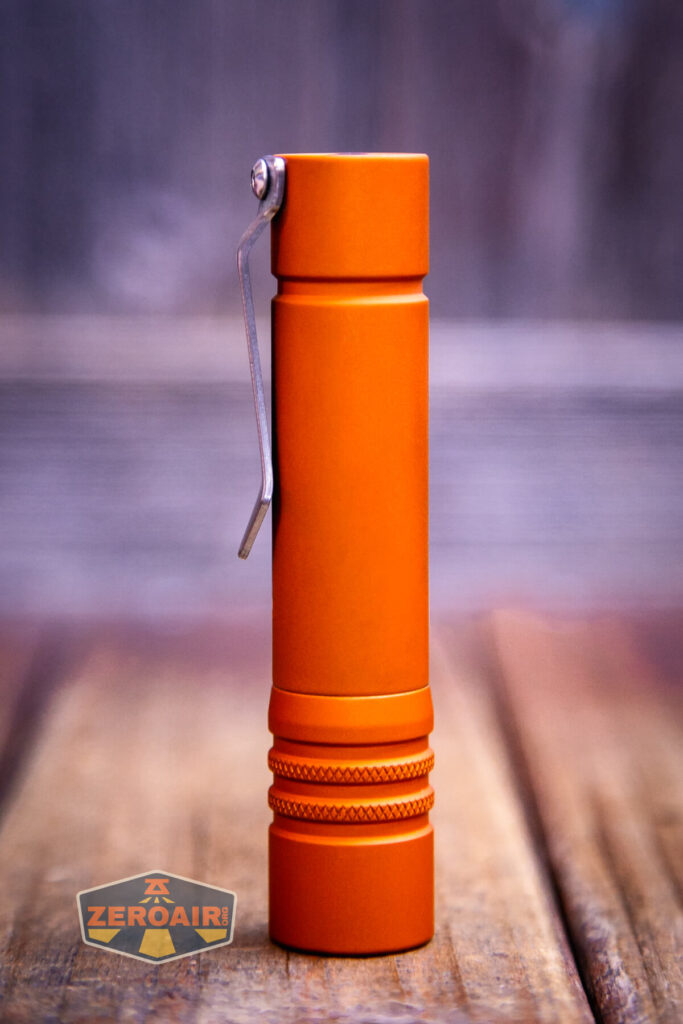 Focusworks EDC F3 Pumpkin Orange flashlight showing all sides