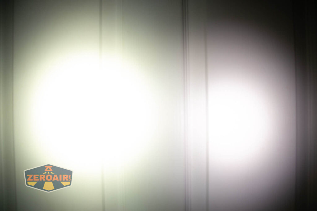 Focusworks EDC F3 Pumpkin Orange flashlight beamshots on door (at 1') compared to nichia 219b 4500K