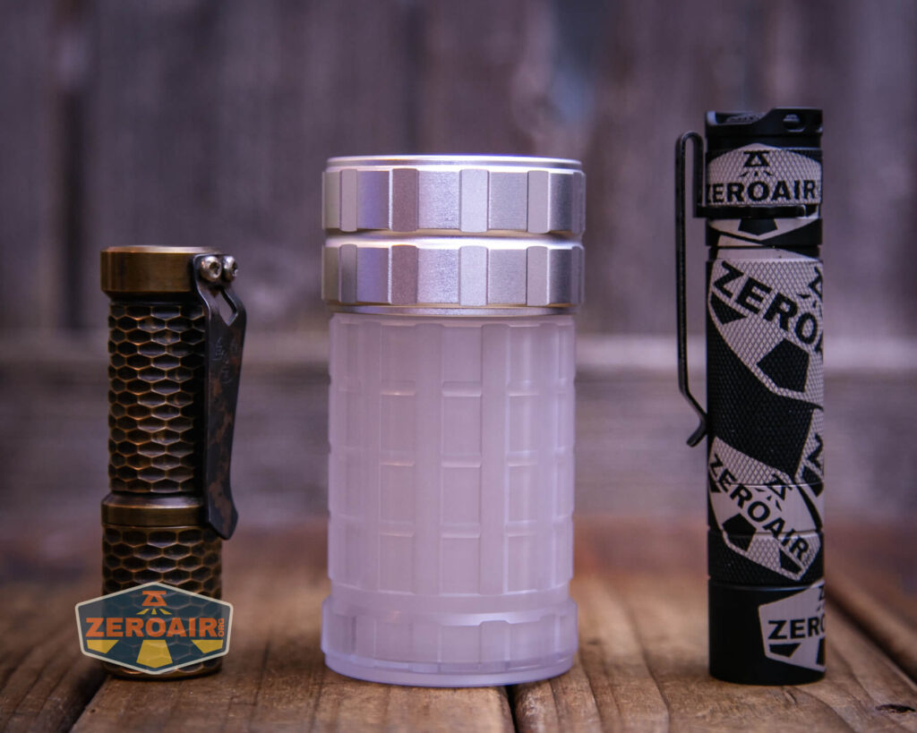 Lumintop Aurora flashlight powerbank on a two dollar bill