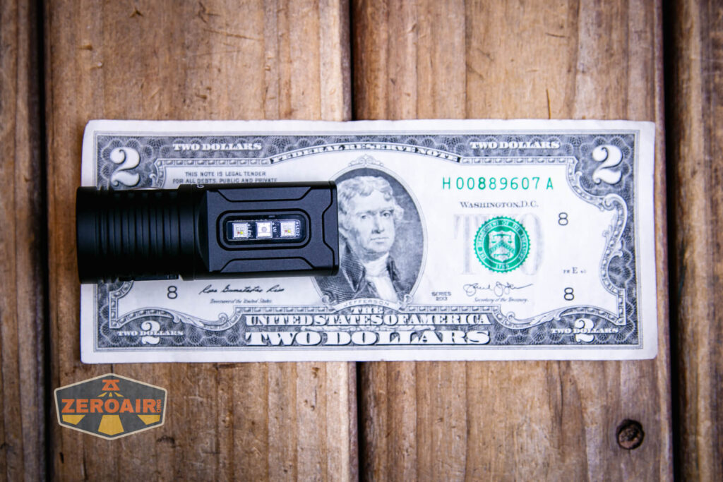 Lumintop GT Nano V5.0 flashlight on a two dollar bill