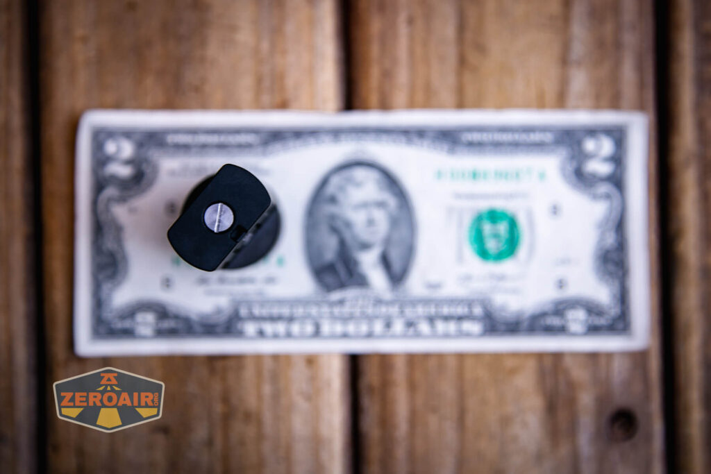Lumintop GT Nano V5.0 flashlight on a two dollar bill