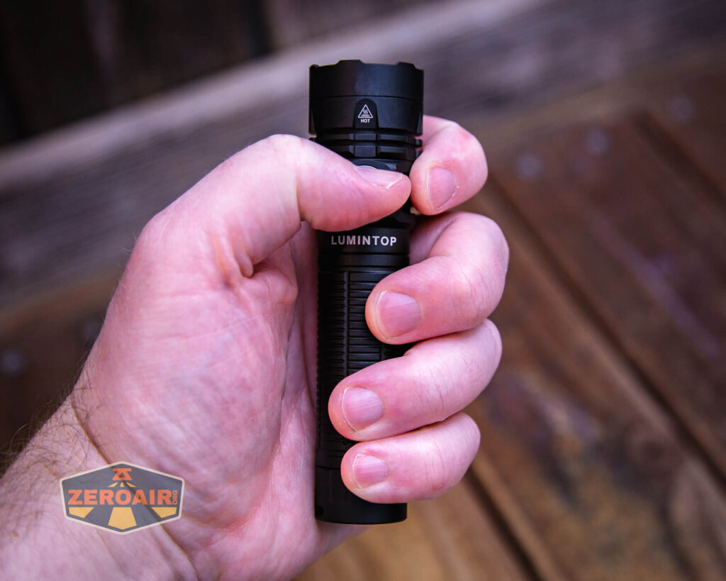 Lumintop W1 flashlight in hand