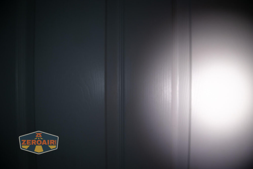 Lumintop W1 flashlight beamshots on door compared to nichia 219b
