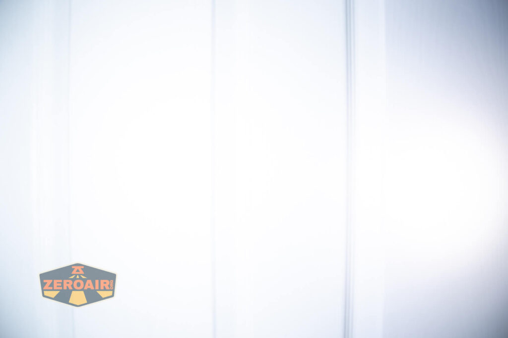 Lumintop W1 flashlight beamshots on door compared to nichia 219b