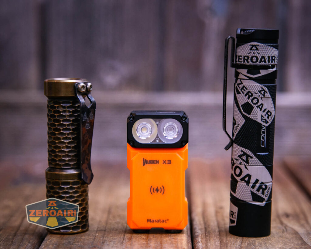 Maratac X-3 Gen II flashlight with two standard sized flashlights