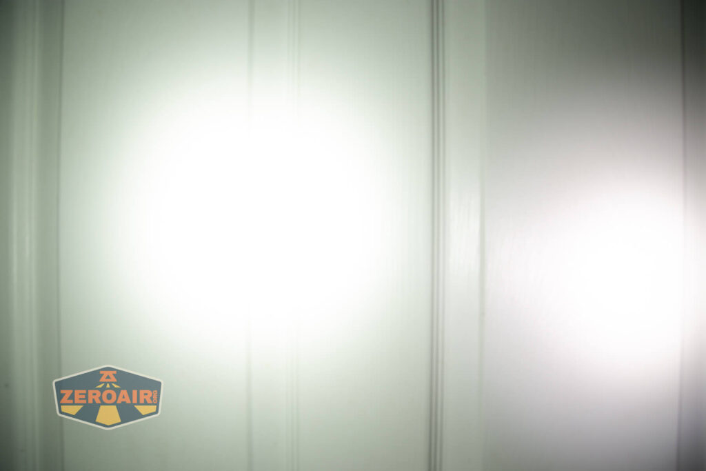 Maratac X-3 Gen II flashlight beamshots on door (at 1') compared to nichia 219b 4500K
