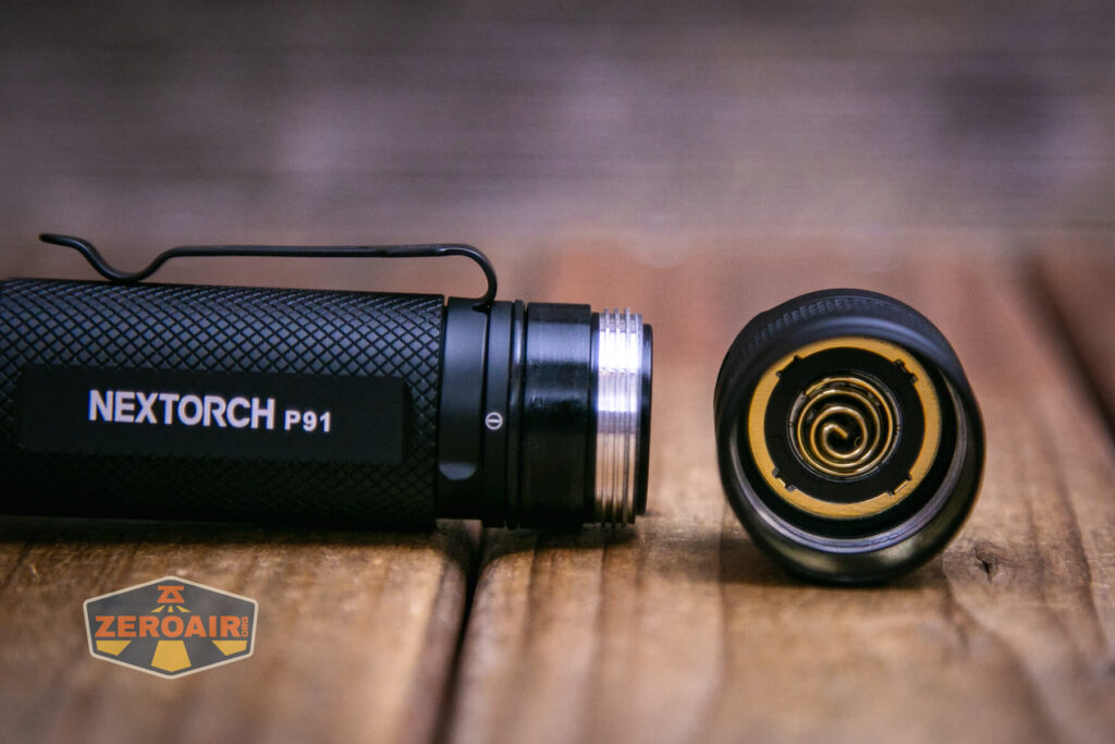 Nextorch P91 flashlight showing tailcap spring and threads
