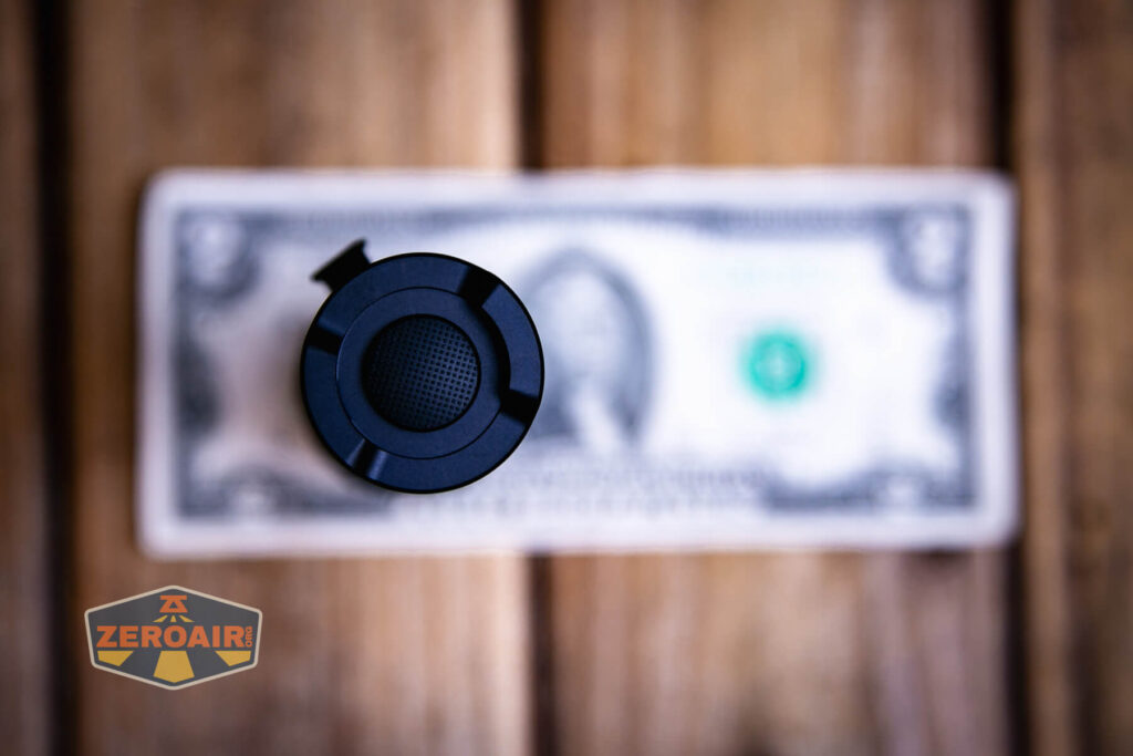 Nextorch P91 flashlight on a two dollar bill