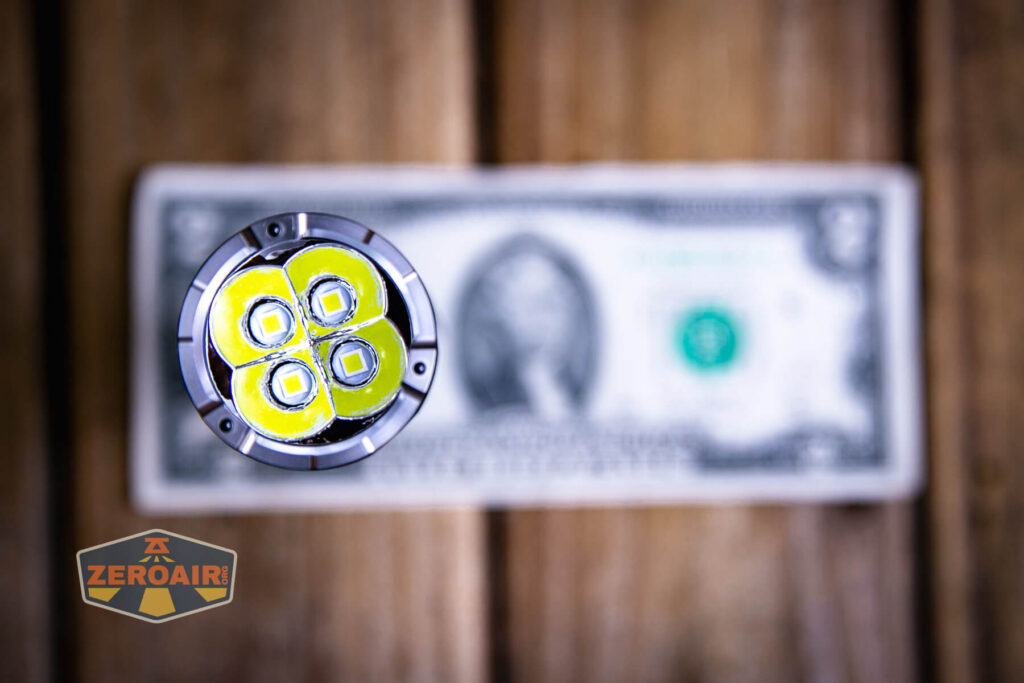 Nextorch P91 flashlight on a two dollar bill