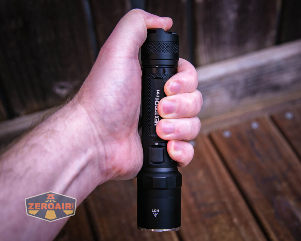 Nextorch P91 flashlight in hand