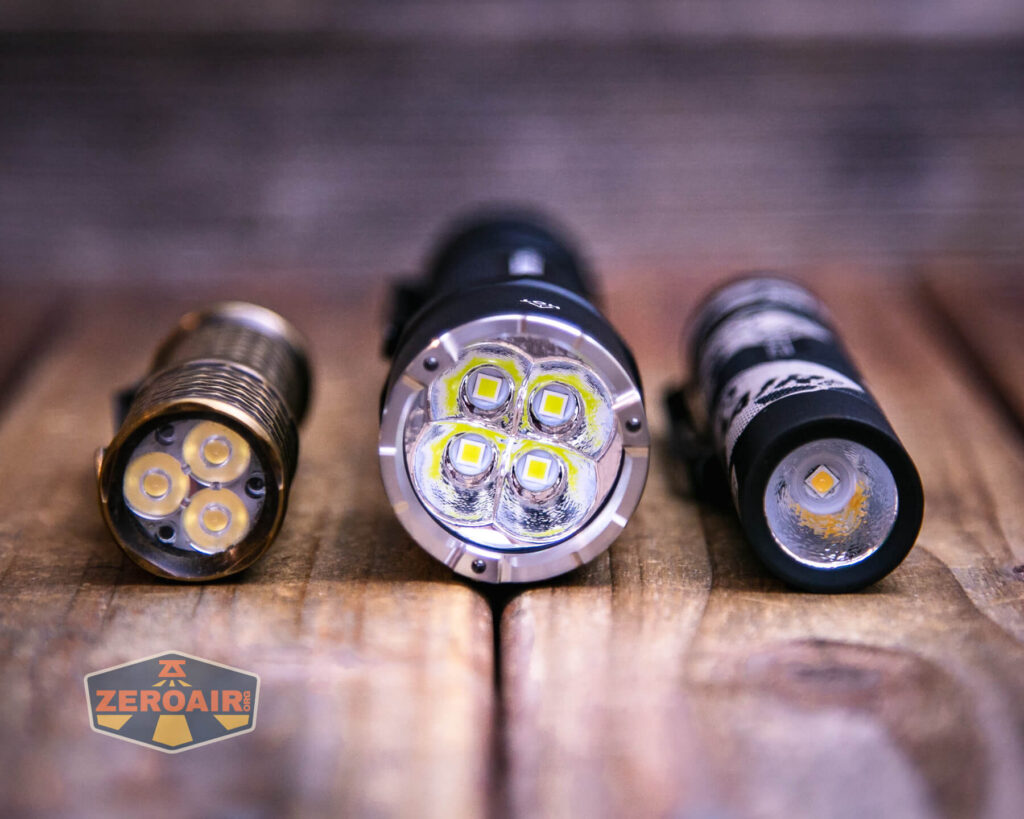 Nextorch P91 flashlight with two standard sized flashlights