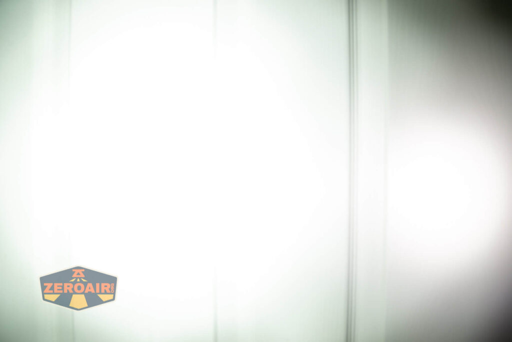 Nextorch P91 flashlight beamshots on door (at 1') compared to nichia 219b 4500K