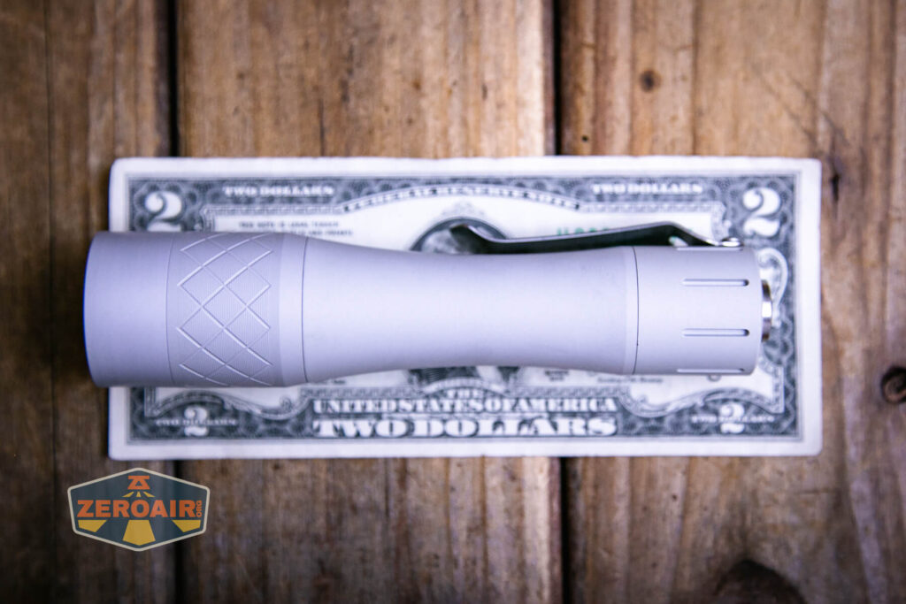 NLightD L3 LEP flashlight on two dollar bill