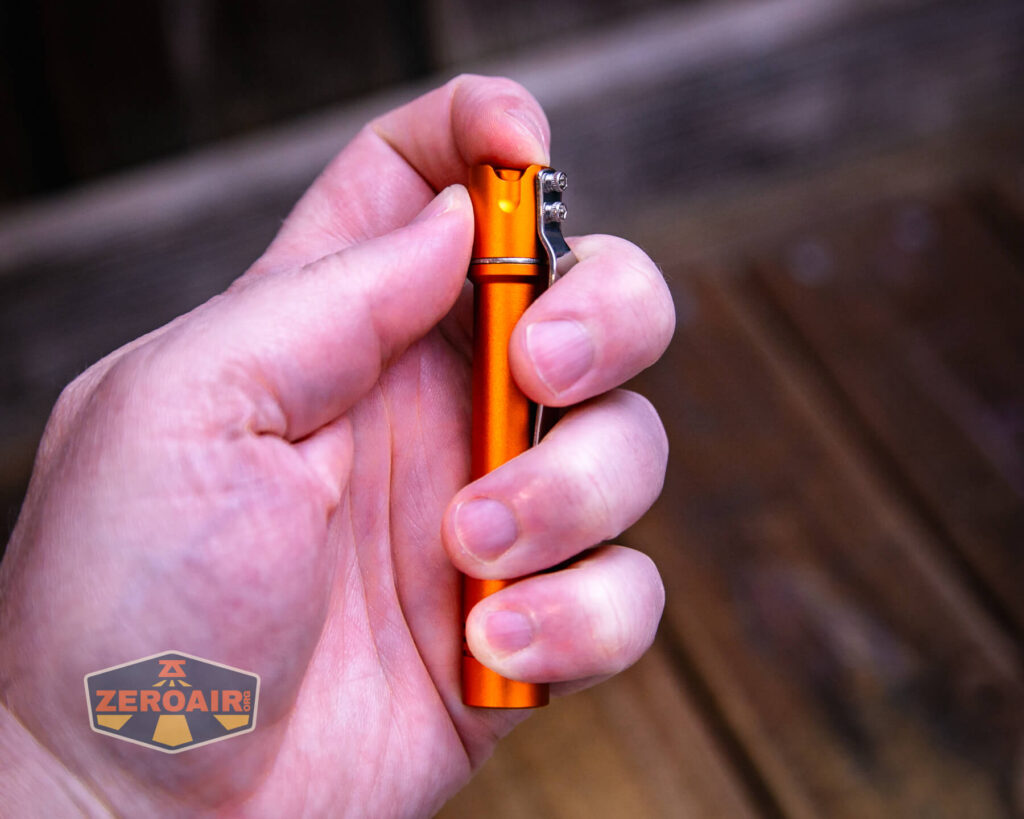 ReyLight Pineapple Mini Mk II flashlight in hand
