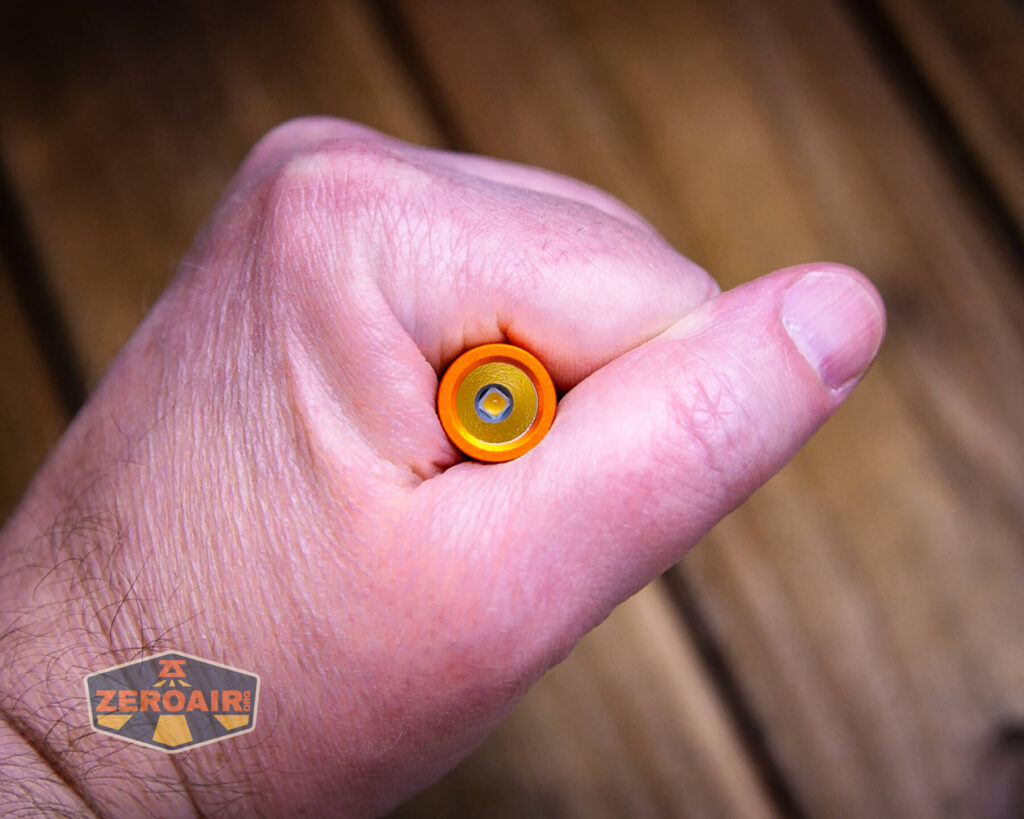 ReyLight Pineapple Mini Mk II flashlight in hand