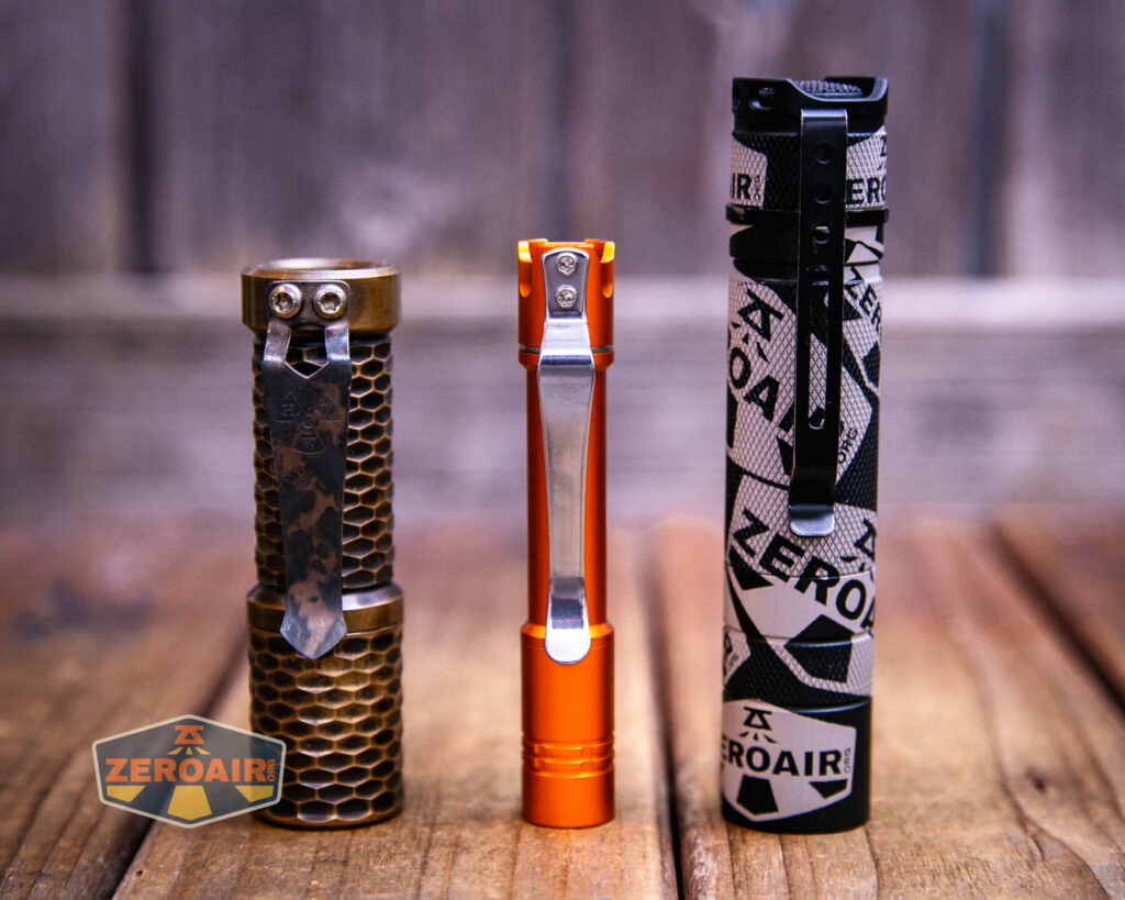 ReyLight Pineapple Mini Mk II flashlight with two standard sized flashlights