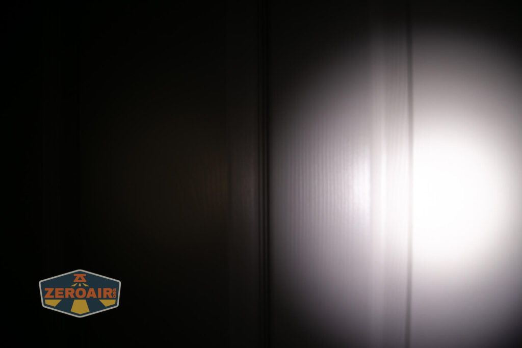 ReyLight Pineapple Mini Mk II flashlight beamshots on door (at 1') compared to nichia 219b 4500K