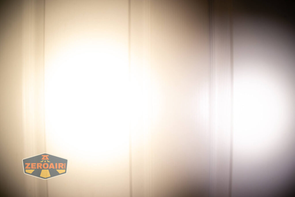 ReyLight Pineapple Mini Mk II flashlight beamshots on door (at 1') compared to nichia 219b 4500K