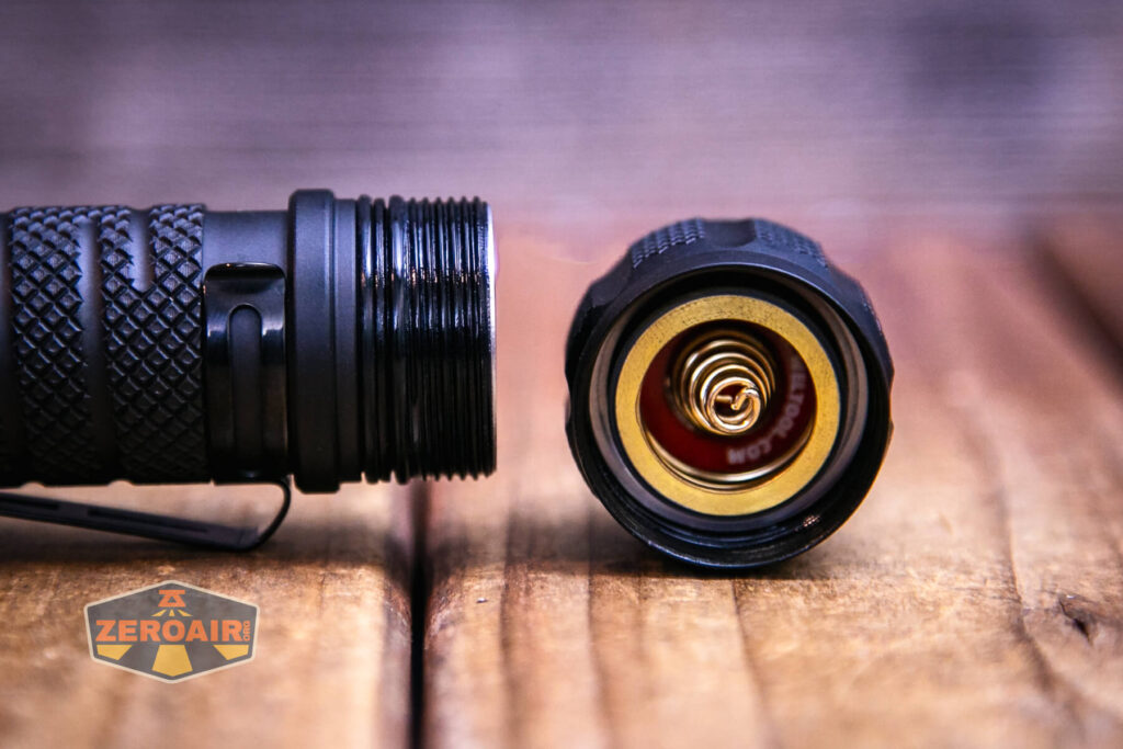 Weltool T12 Plus Nine Dragons flashlight tailcap off