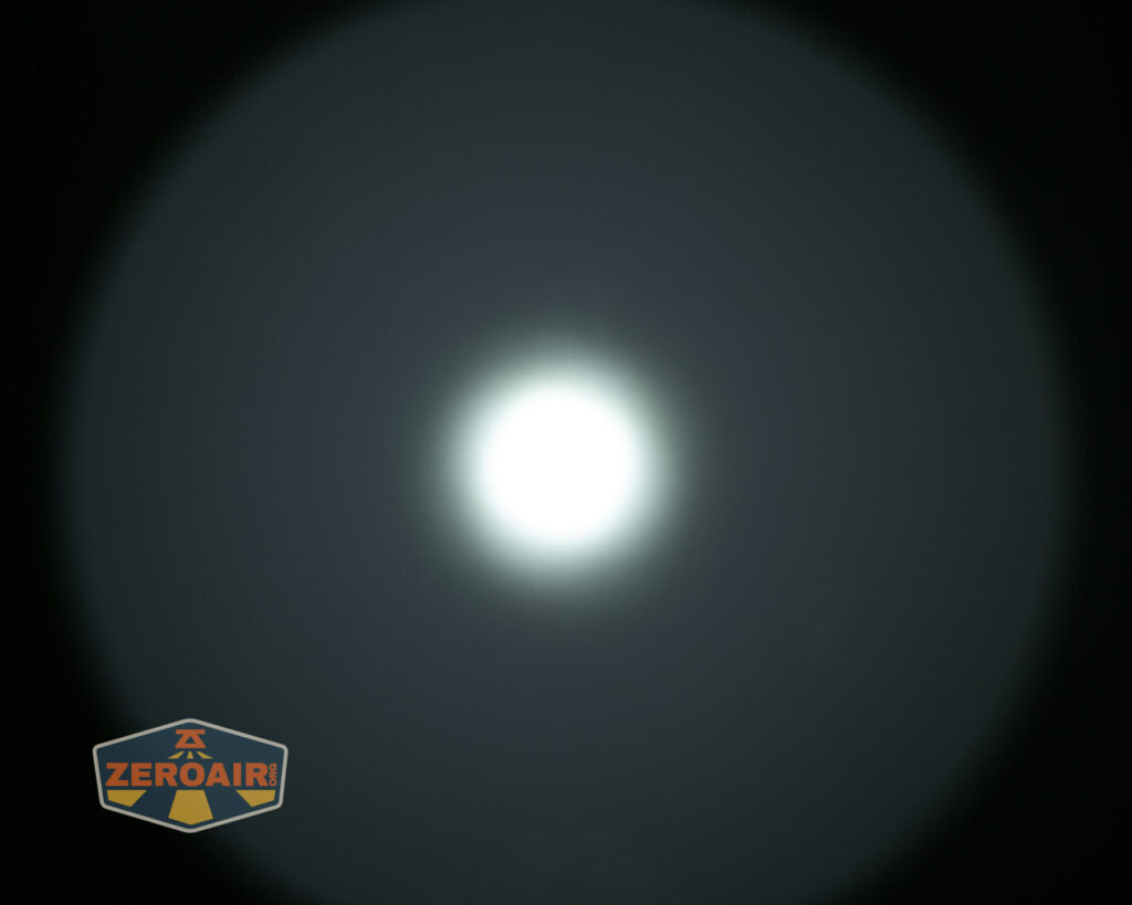 Weltool T12 Plus Nine Dragons flashlight beamshots on ceiling