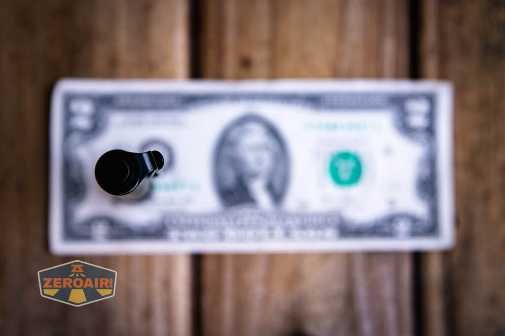 Acebeam PT20 portable EDC penlight on a two dollar bill