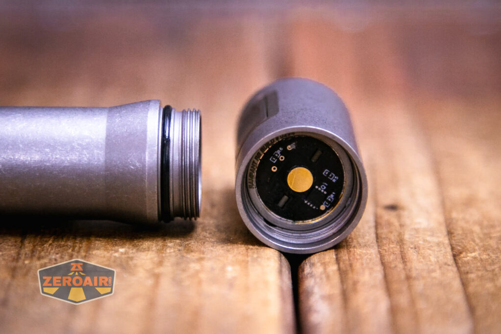 Exceed Designs Rampant R8 flashlight head off showing threads and contact point