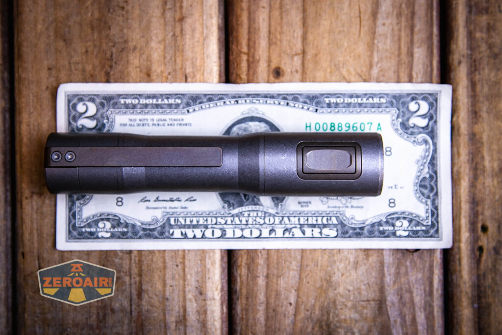 Exceed Designs Rampant R8 flashlight on a two dollar bill